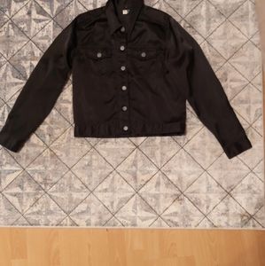 Black sheen jacket. Size medium. Good condition. No holes no stains.